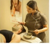 Hands holding binoculars in the Austrian Alps